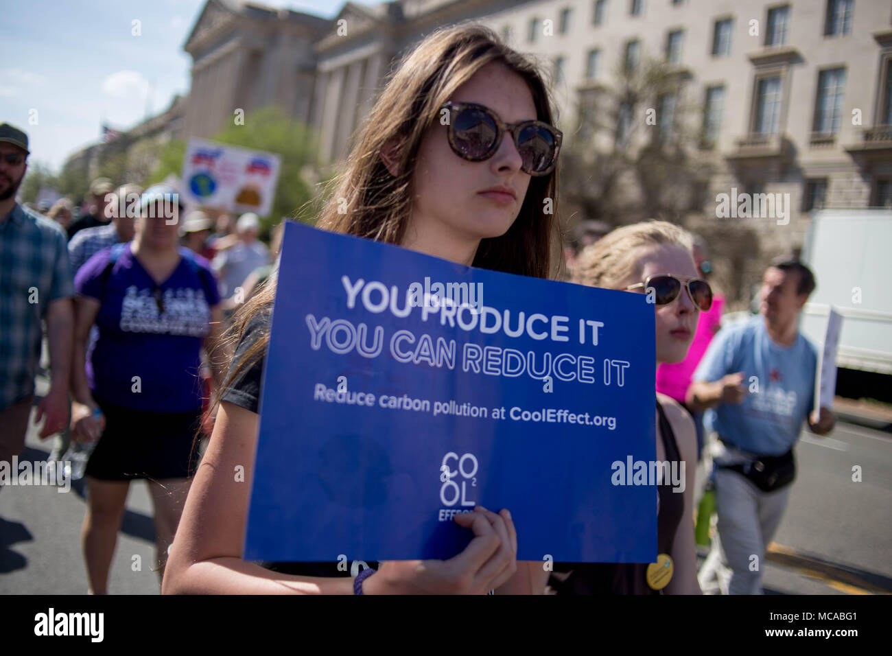 Washington DC, USA 14th April 2018 Protestors walk with signs and banners along Constitution Avenue during the March For Science, a rally sponsored by the nonprofit Nature Conservancy. Credit: Michael Candelori/Alamy Live News Stock Photo