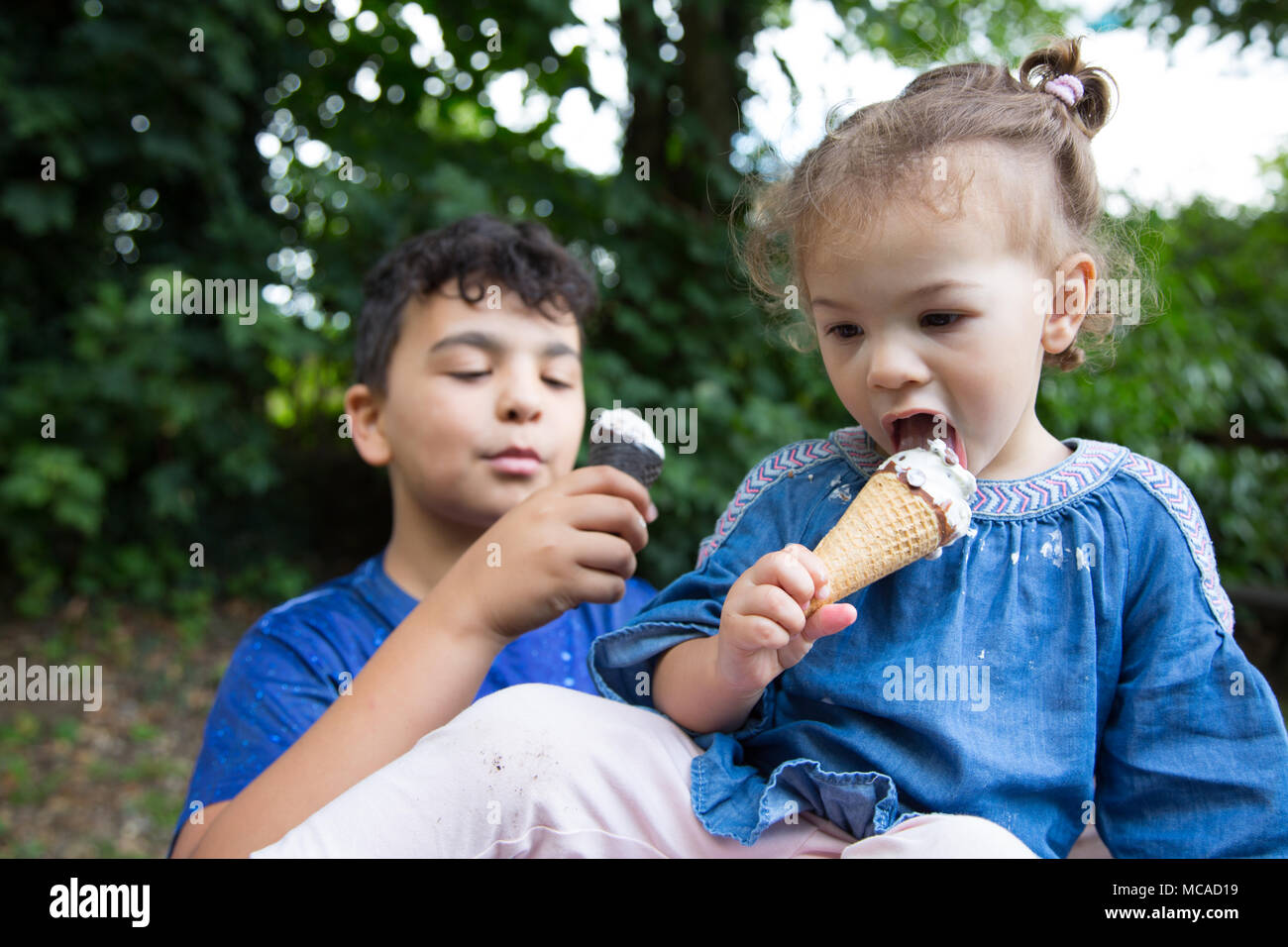 Children eating ice cream Stock Photo Alamy