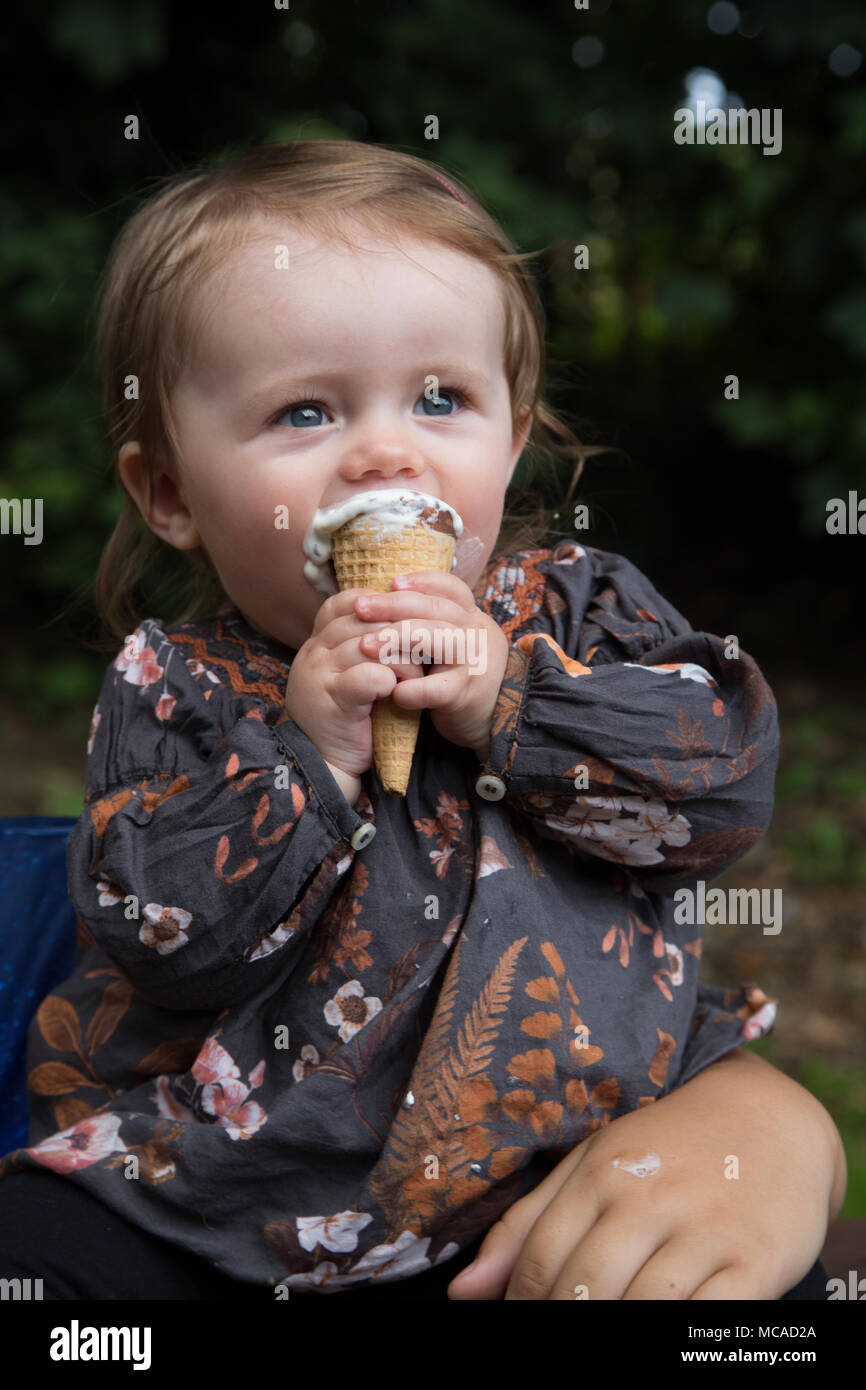 10 month old baby eating ice cream Stock Photo Alamy
