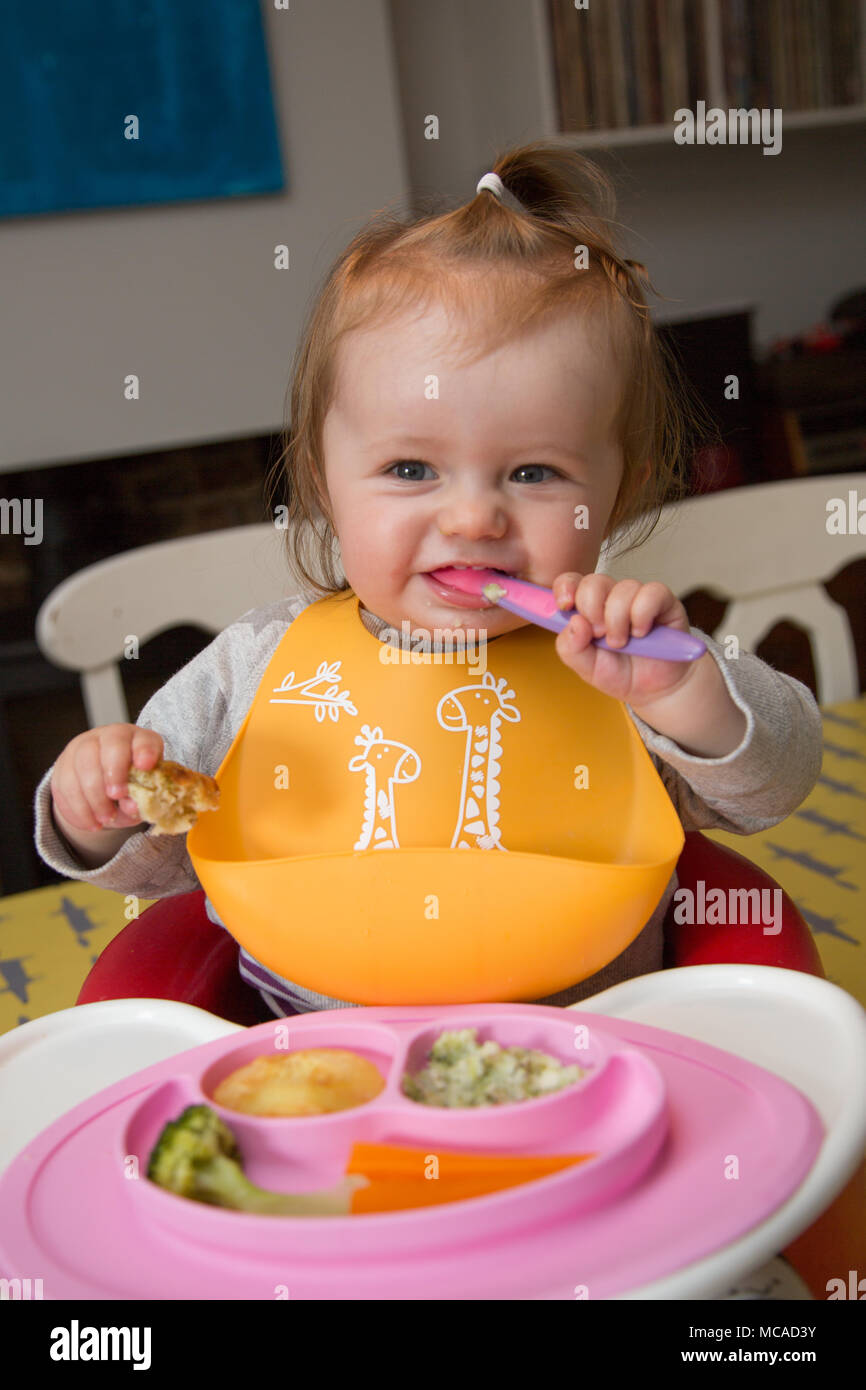 10 month old Baby Led Weaning Stock Photo