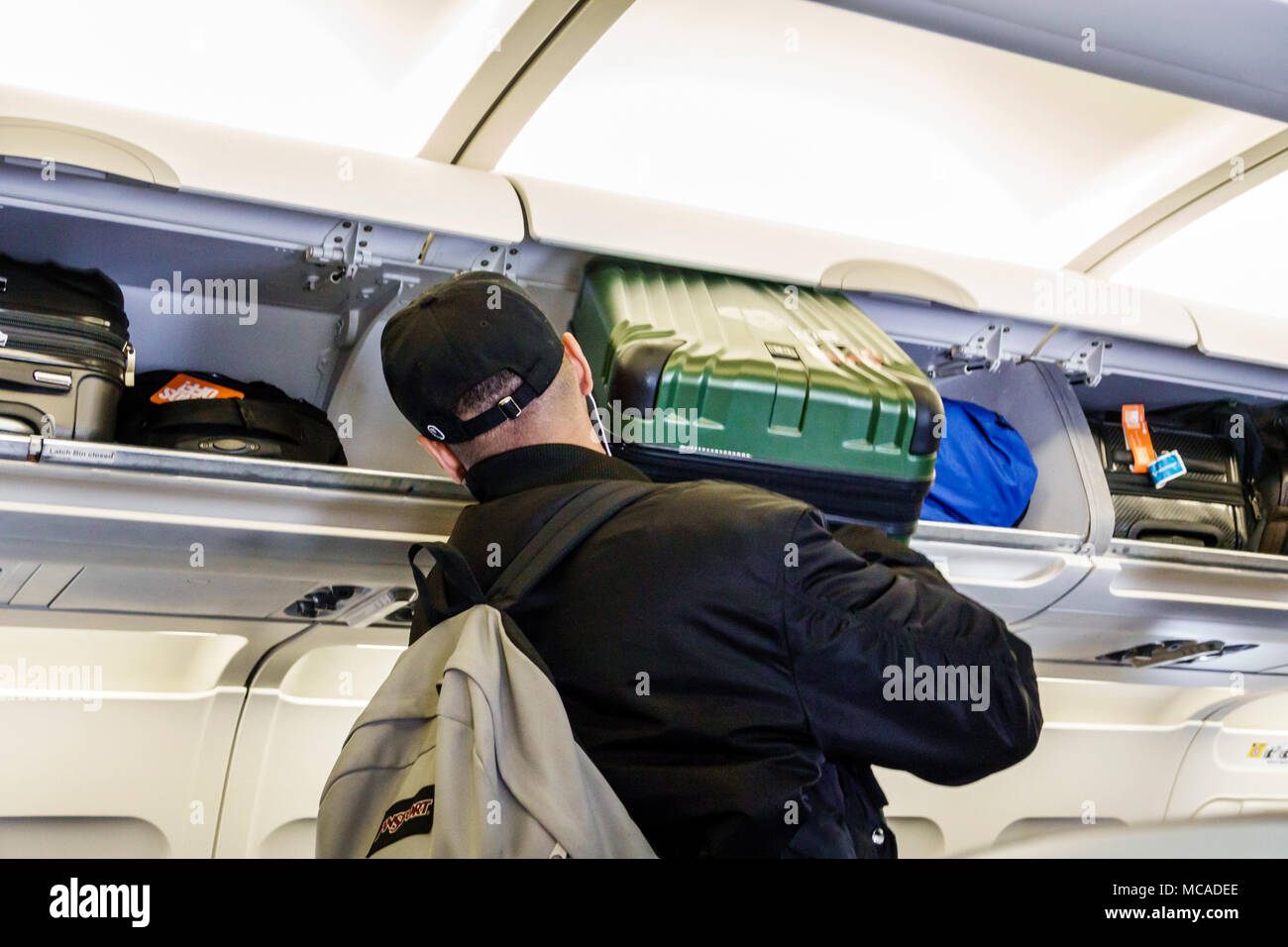 Carry on hand luggage baggage suitcase suitcases cabin compartment