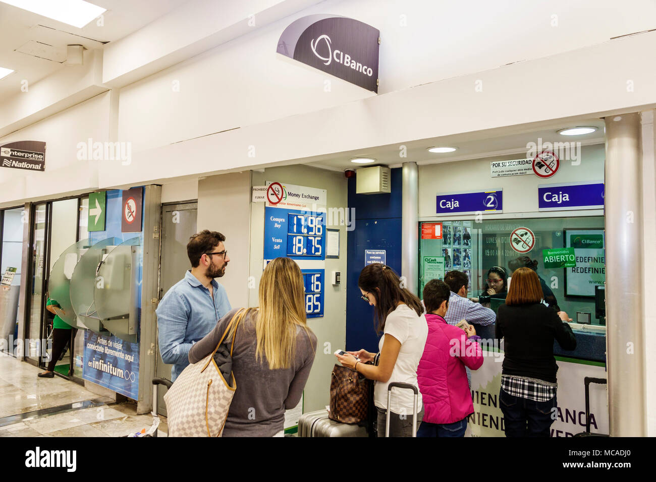 Mexico City,Mexican,Hispanic,Benito Juarez International Airport MEX,terminal,CIBanco,currency exchange agency,man men male,woman female women MX18030 Stock Photo