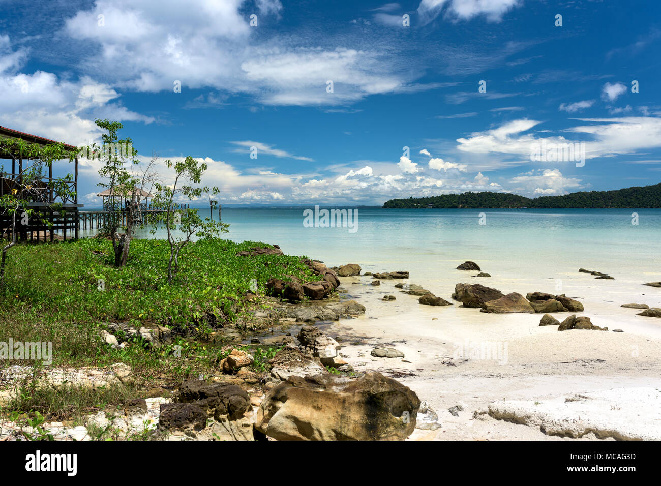 tropical-beach-with-turquoise-clean-water-blue-sky-and-white-sand
