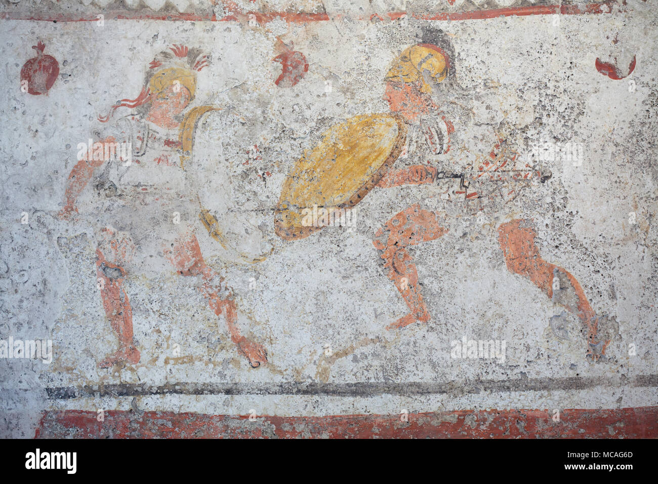 Duel of warriors depicted in the Lucanian fresco dated from the last decades of the 4th century BC from the Tomb 4 of the Andriuolo Necropolis on display in the Paestum Archaeological Museum (Museo archeologico di Paestum) in Paestum, Campania, Italy. Stock Photo
