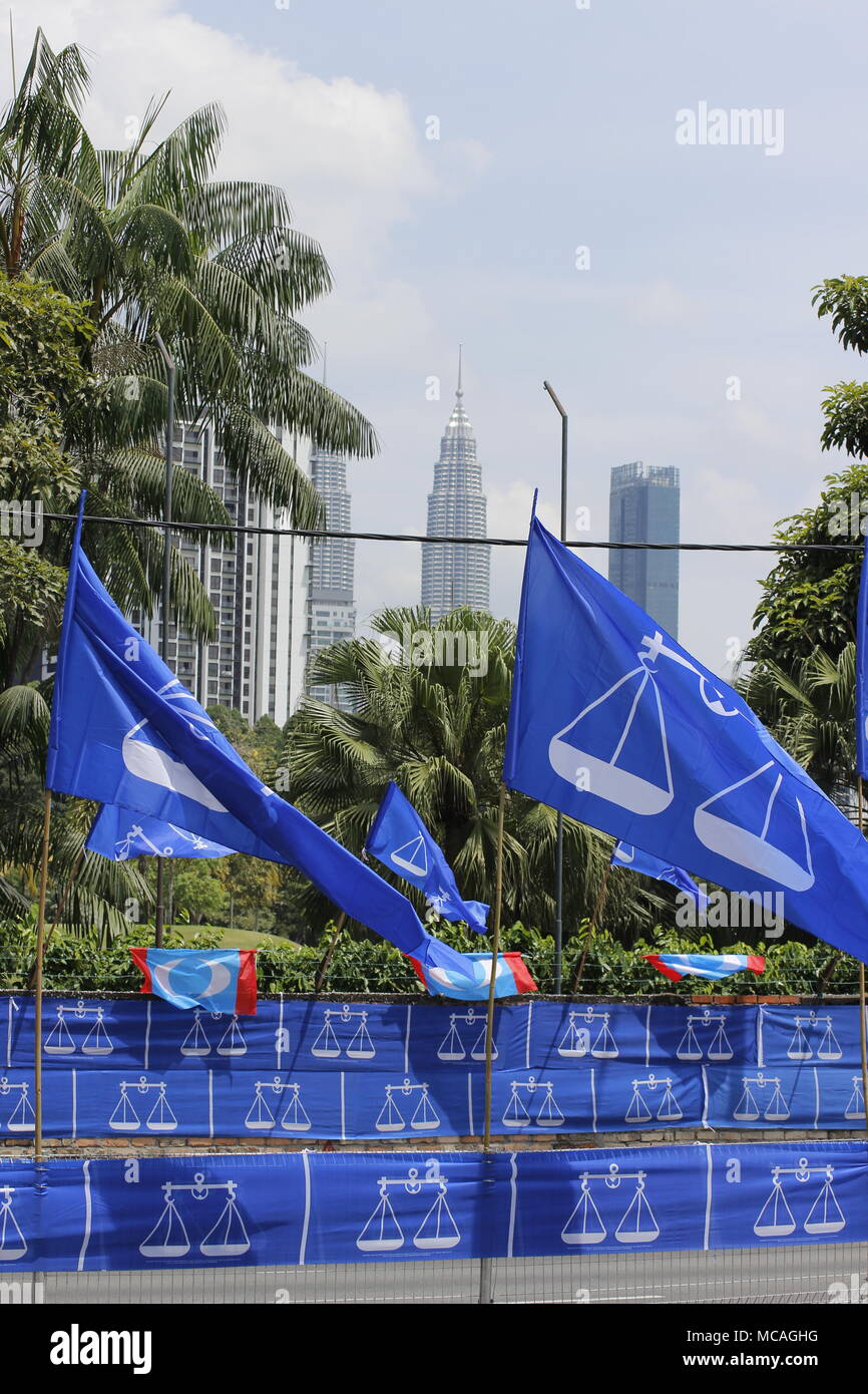 Malaysian General Elections 2018 campaigning in Kuala Lumpur, Malaysia. National coalition party flags in blue. Stock Photo