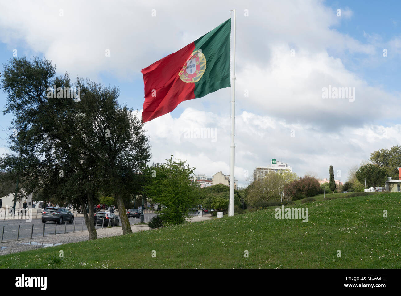 The portuguese flag waving in Parque Edoardo VII in Lisbon, Portugal Stock Photo