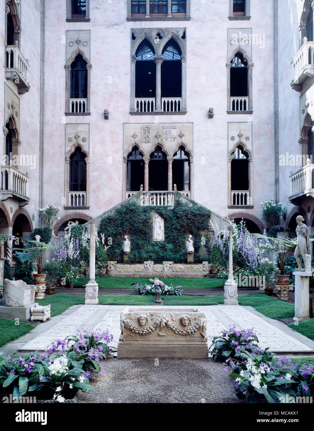 The Isabella Stewart Gardner Museum or Fenway Court, as the museum was known during Isabella Stewart Gardner's lifetime, is a museum in the Fenway-Kenmore neighborhood of Boston, Massachusetts, located within walking distance of the Museum of Fine Arts and near the Back Bay Fens. The museum houses an art collection of world importance, including significant examples of European, Asian, and American art, from paintings and sculpture to tapestries and decorative arts. In 1990, thirteen of the museum's works were stolen; the high-profile crime remains unsolved and the artwork's location is still  Stock Photo