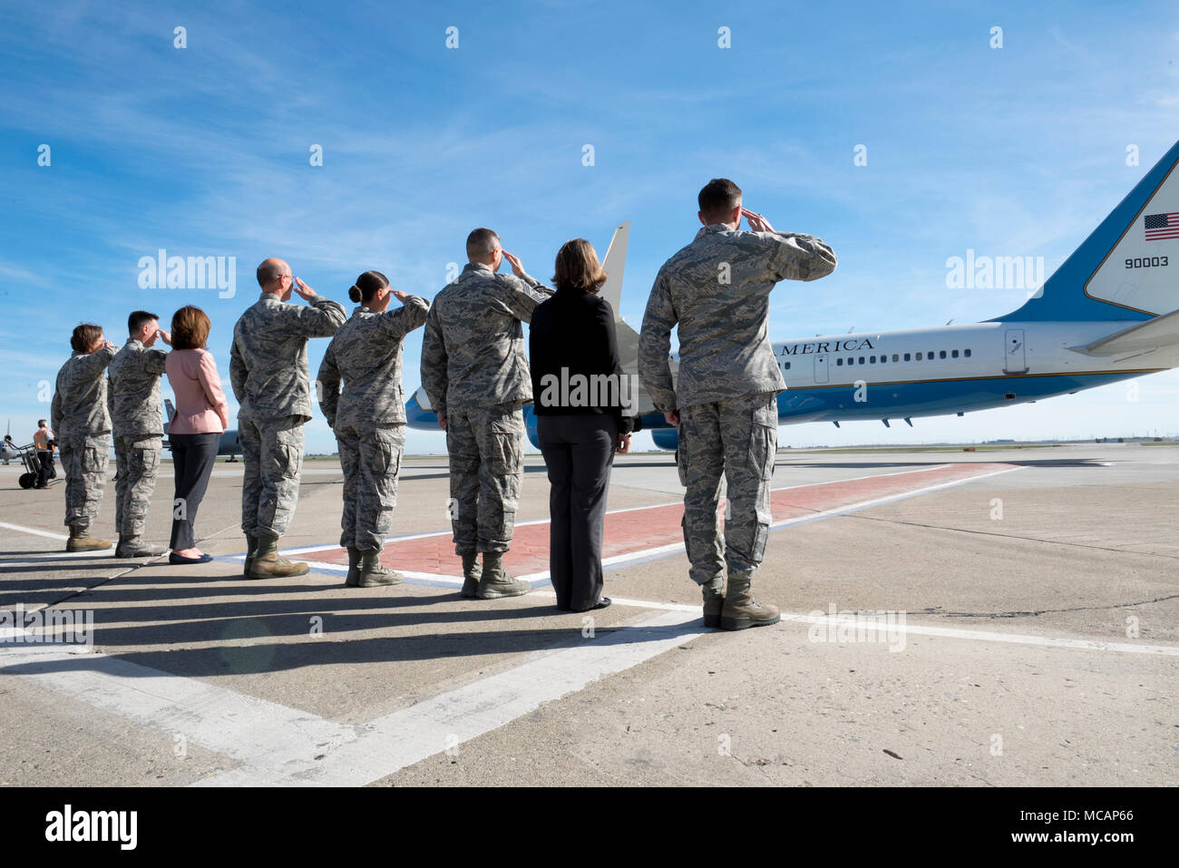 Leadership from Travis Air Force Base, Calif., salute the departure of Chairman of the Joint Chiefs of Staff Marine Corp Gen. Joe Dunford, Feb. 1, 2018, during a gas and go. (U.S. Air Force Photo by Lan Kim) Stock Photo