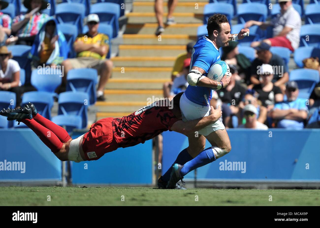 Queensland, Australia . 15th April, 2018. Ruaridh Jackson (SCO) is tackled by Justin Tipuric (WAL). Rugby 7s. XXI Commonwealth games. Robina Stadium. Gold Coast 2018. Queensland. Australia. 15/04/2018. Credit: Sport In Pictures/Alamy Live News Credit: Sport In Pictures/Alamy Live News Stock Photo