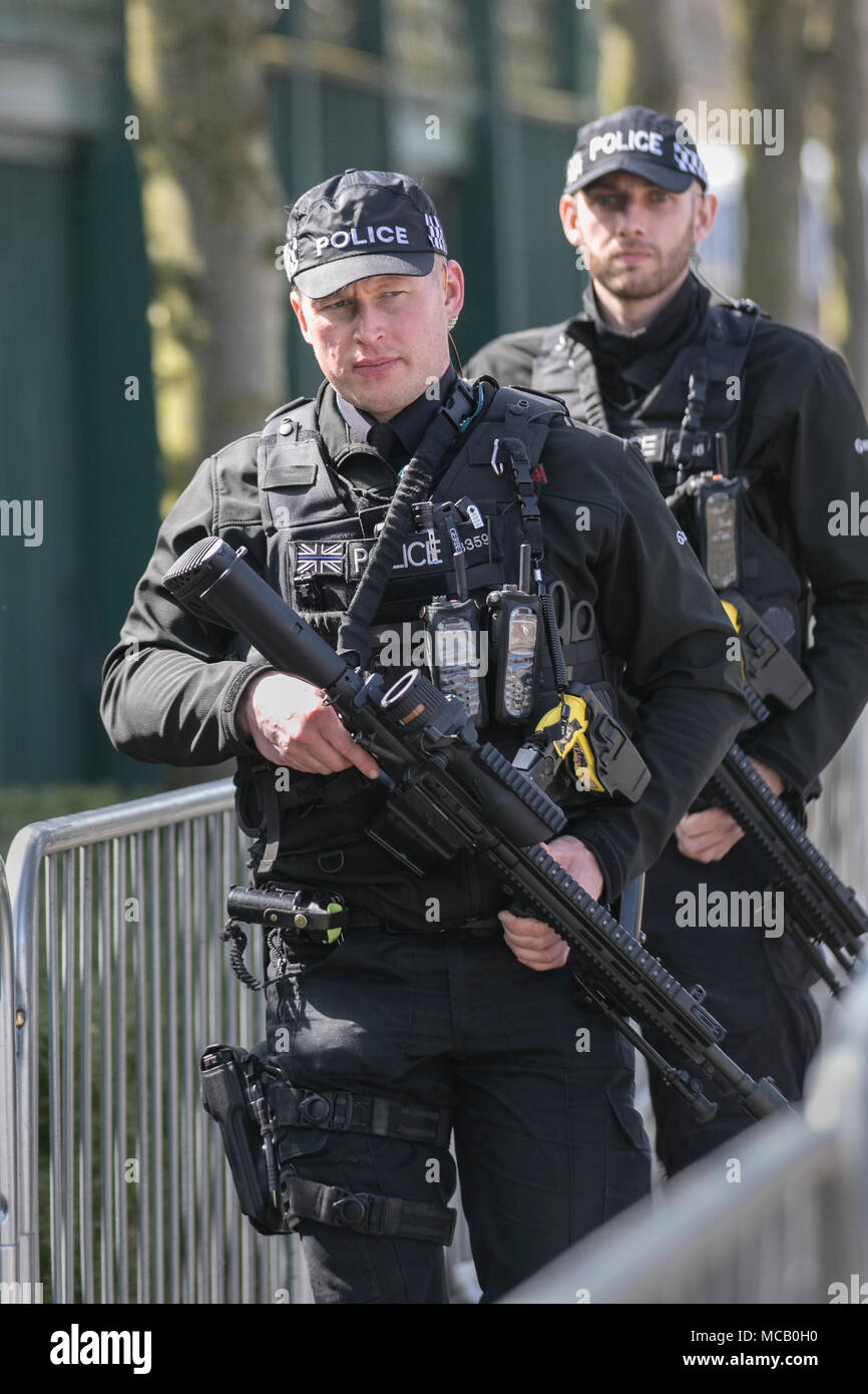 Authorised firearms officer (AFO) a British police officer in Merseyside Police at Liverpool, UK.  Weapons, policemen, gun, weapon, firearm, military, handgun,  pistol, security, crime, white, shot, danger, black uniforms, firearms and equipment of British Armed Police on duty at the Labour Party Annual Conference, 2018. Stock Photo