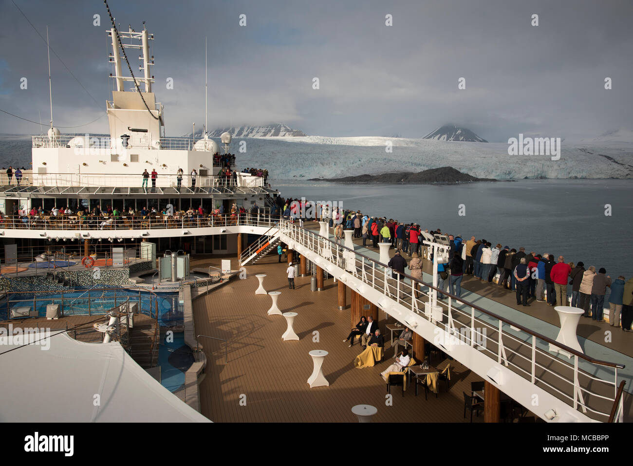 Cruise ship Mein Schiff 1 visiting Nordenskiöldbreen a glacier on Svalbard archipelago in the arctic Atlantic Ocean. Stock Photo
