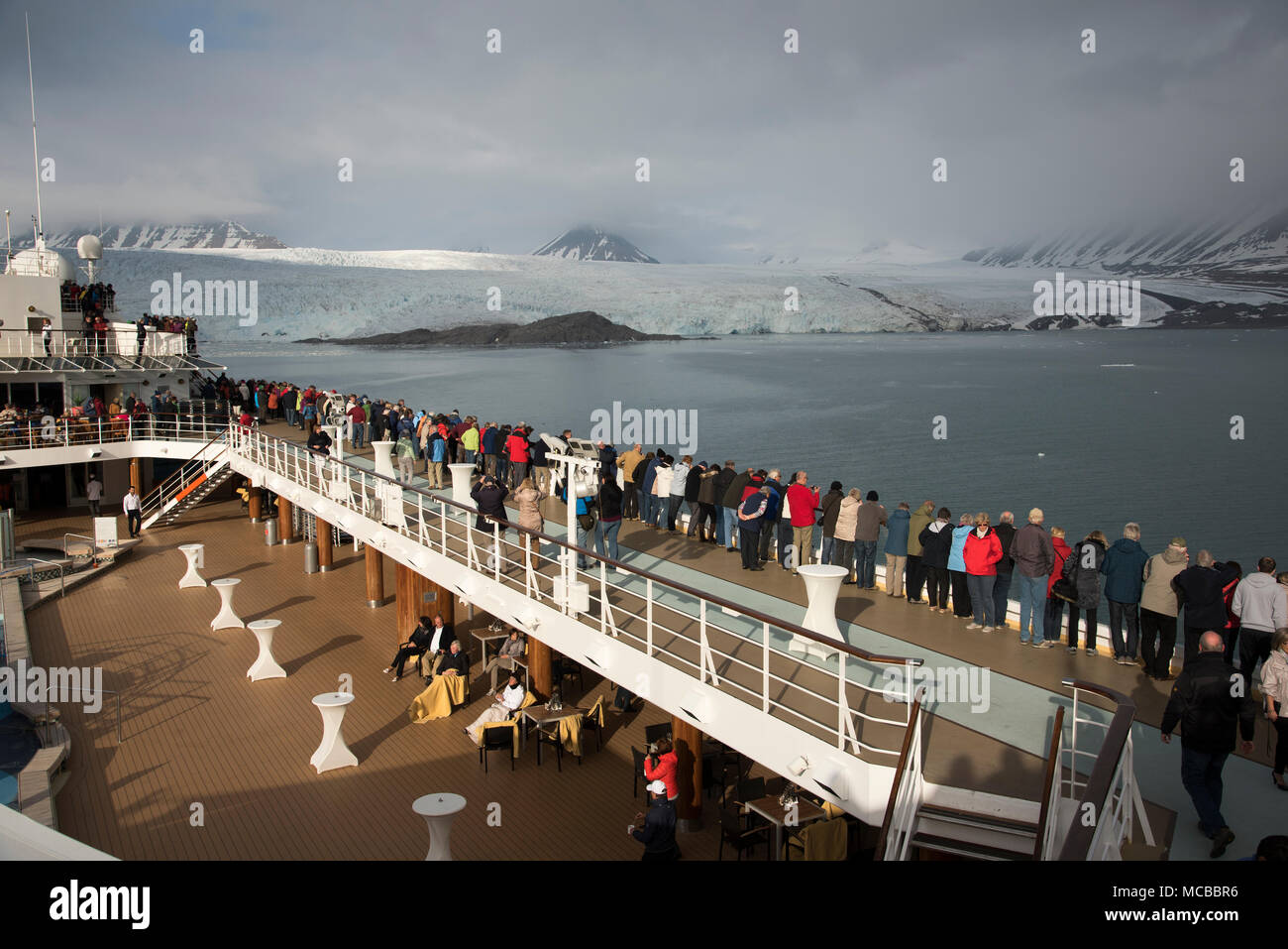 Cruise ship Mein Schiff 1 visiting Nordenskiöldbreen a glacier on Svalbard archipelago in the arctic Atlantic Ocean. Stock Photo