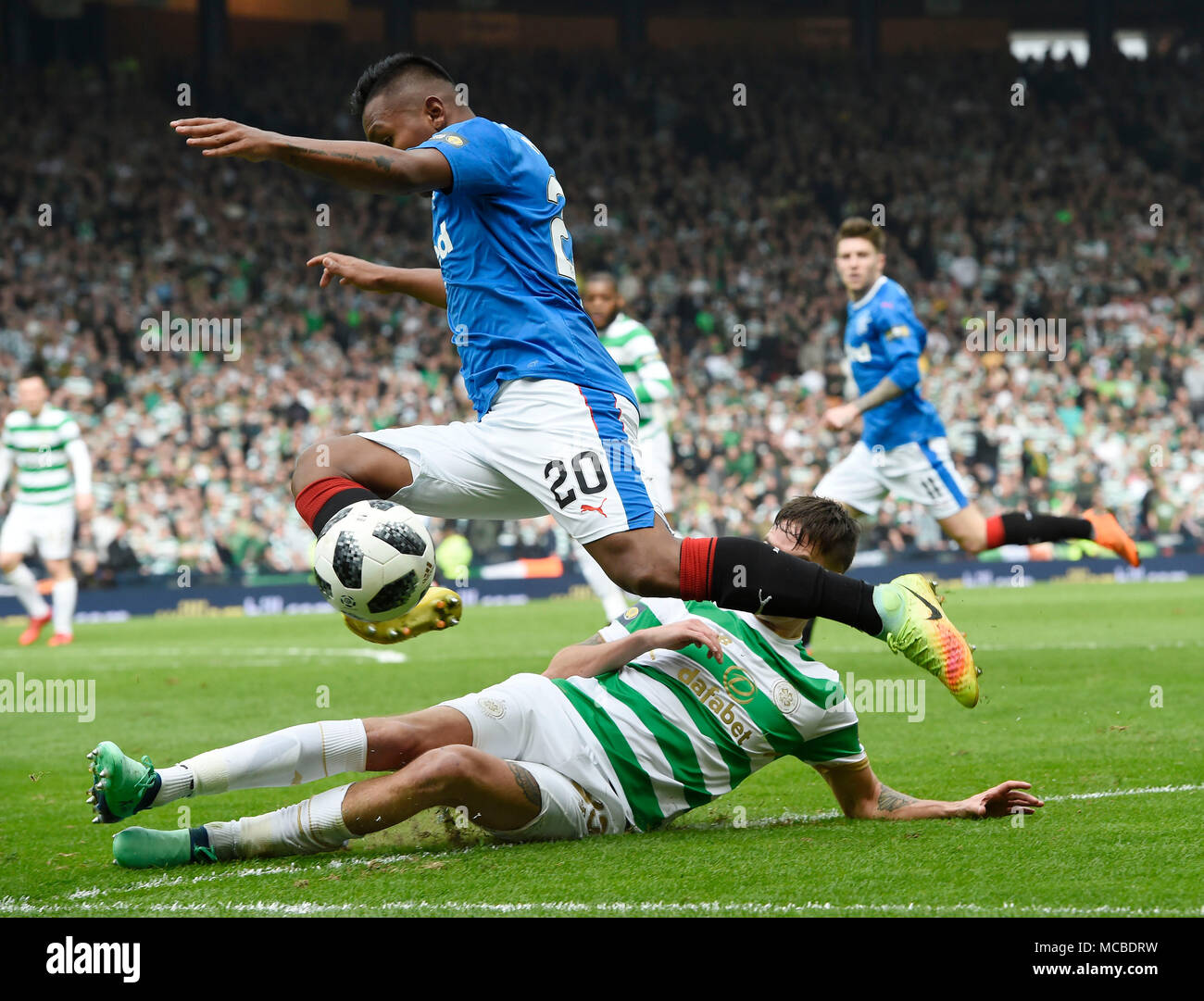 Rangers Alfredo Morelos is tackled by CelticÕs Michael Lustig during the William Hill Scottish Cup semi final match at Hampden Park, Glasgow. Stock Photo