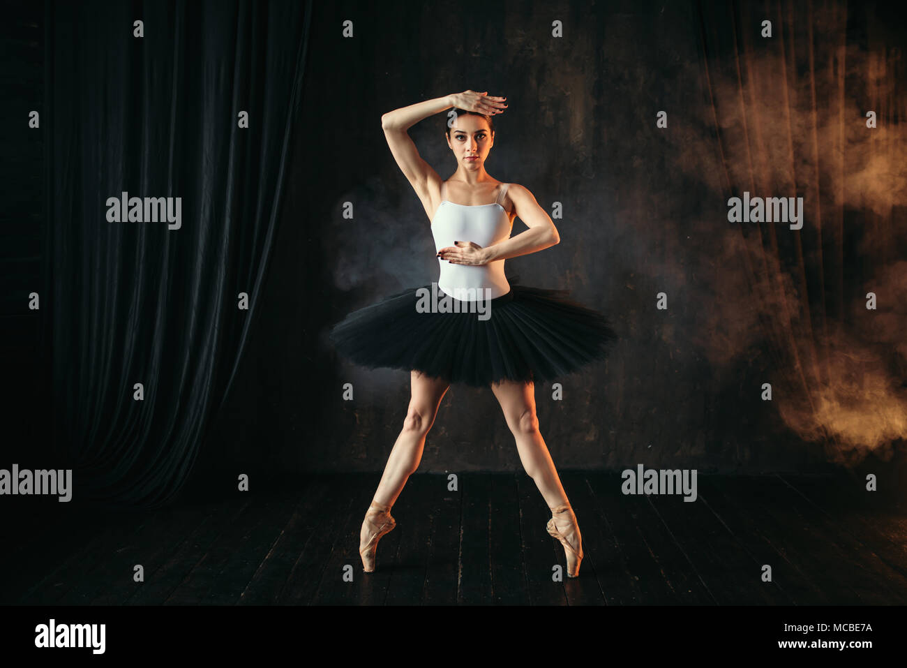 Elegance ballerina in action on theatrical stage Stock Photo