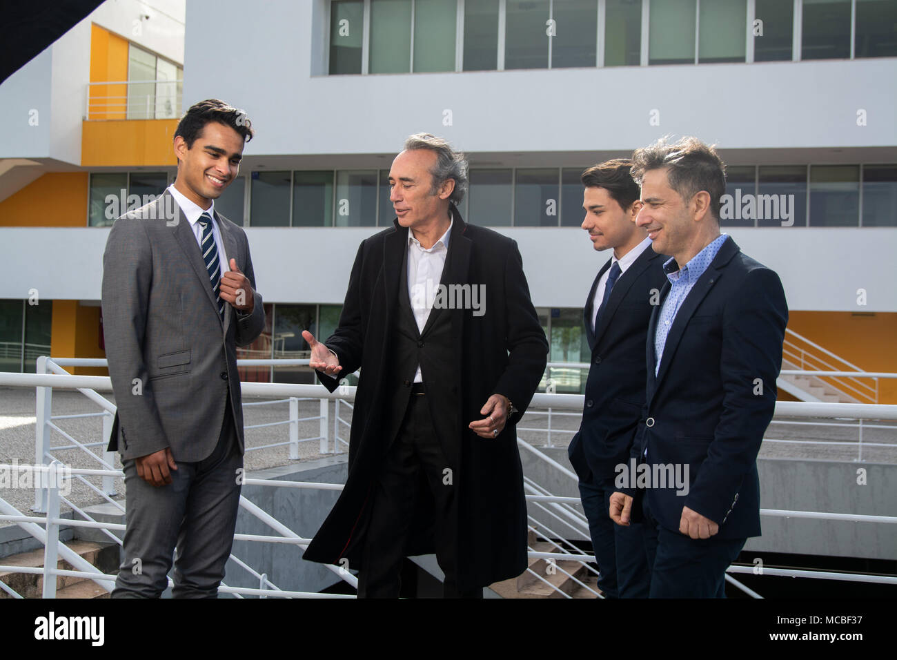 Group of Business man with suit in outdoor ambient Stock Photo - Alamy