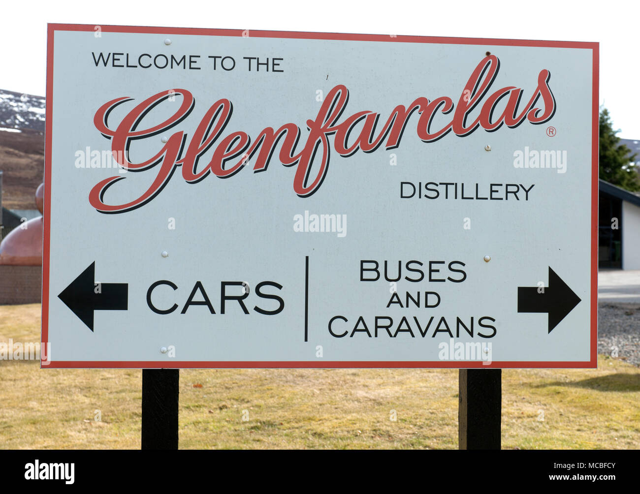 Welcome sign at the entrance to Glenfarclas Whisky Distillery, Speyside, Ballindalloch, Banffshire, Scotland, UK Stock Photo