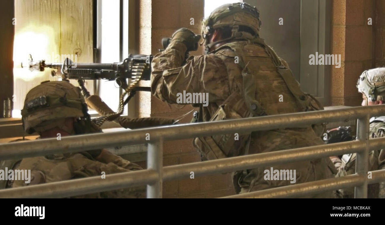 Soldiers with 3rd Battalion, 41st Infantry Regiment, 1st Stryker Brigade Combat Team, 1st Armored Division return fire during a training exercise at the Combined Arms Collective Training Facility, Orogrande, N.M., March 22, 2018. 3-41 IN participated as the opposing force during Iron Focus 18.1, a brigade exercise designed to prepare 3rd Armored Brigade Combat Team, 1stArmored Division for a National Training Center rotation. Stock Photo