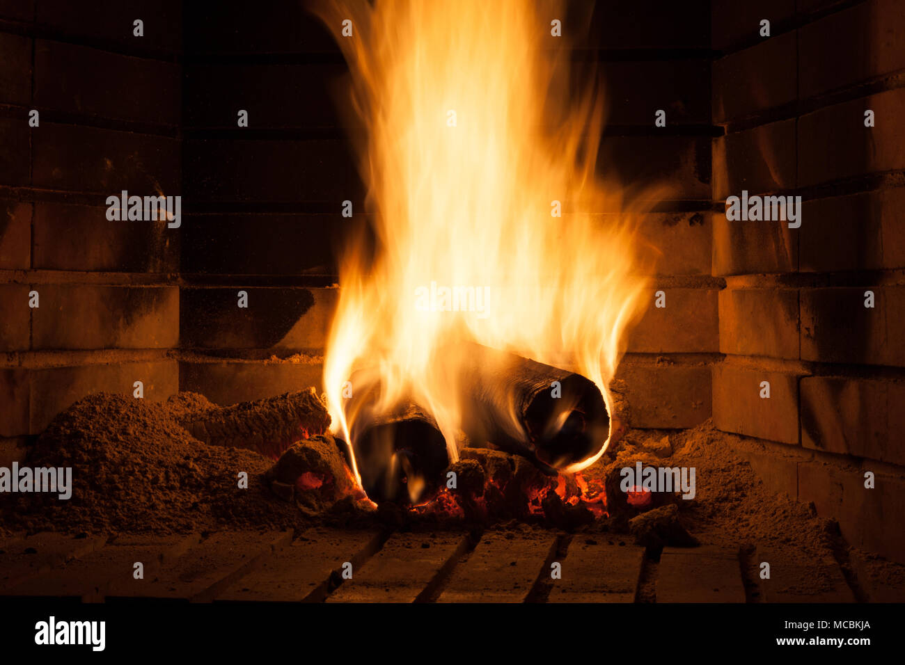 High blaze in fireplace Stock Photo - Alamy