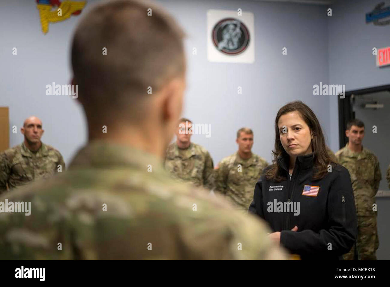 Congresswoman Rep. Elise Stefanik is briefed by one of the leading Soldiers from 1st Brigade Combat Team, 10th Mountain Division at Fort Drum regarding the Regionally Aligned Forces mission as the East Africa Response Force in Djibouti, Africa. Stock Photo
