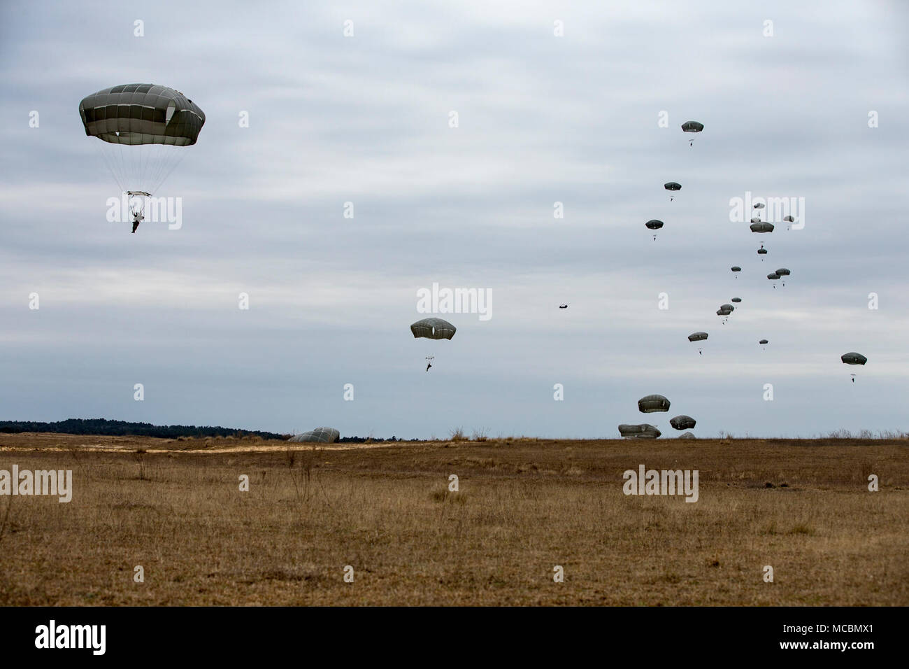 Low Level Static Line U.S. service members perform a low level static line jump as part of ...