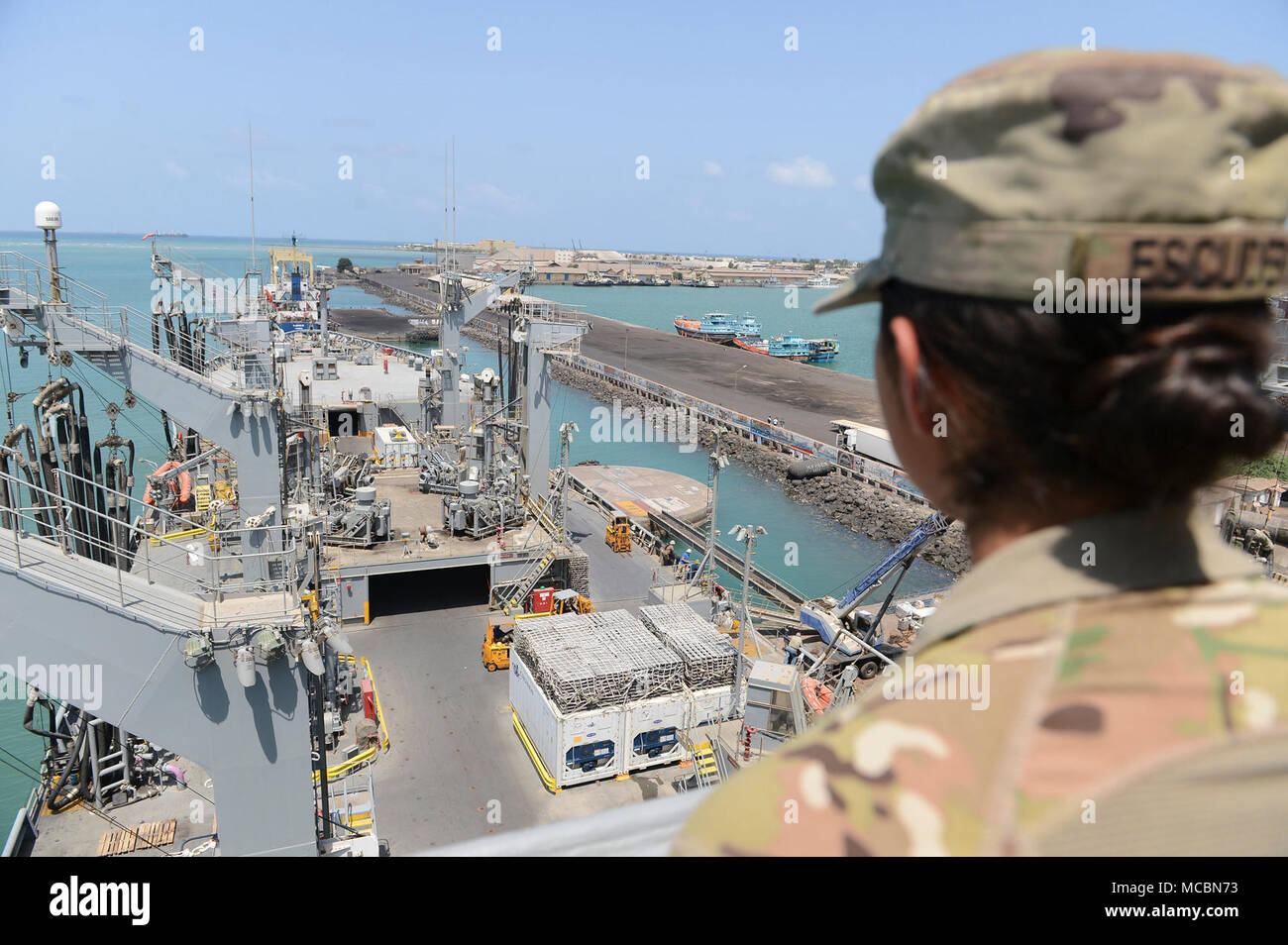 PORT OF DJIBOUTI, Djibouti –Soldiers assigned to the 3-144 Infantry Regiment tour the USNS John Lenthall (T-AO-189) during cargo replenishment operations with the Camp Lemonnier Supply Department, Mar. 26, 2018. Lenthall is a Henry J. Kaiser-class fleet replenishment oiler of the United States Navy. Her motto is 'Shaft of the Spear.' NAVSUP FLC Sigonella stands ready to fulfill logistic responsibilities and serves as a vital link to enable mission success across Europe and Africa. NAVSUP FLC Sigonella is one of eight fleet logistics centers under NAVSUP, which provides global logistics, busine Stock Photo
