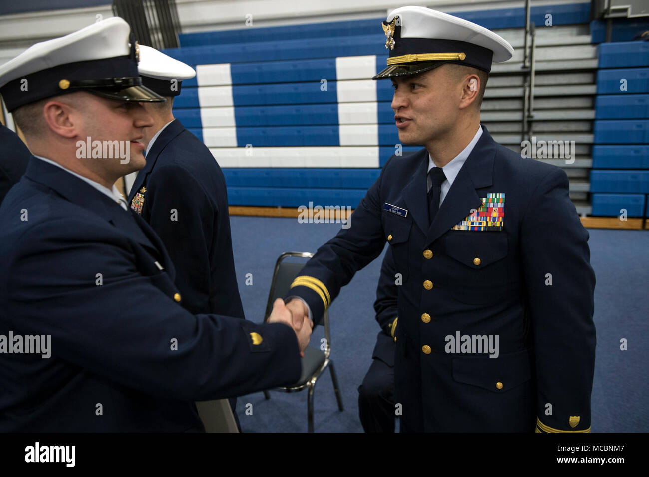 LT Steven Graff, with the Coast Guard Office of Reserve Affairs, shakes