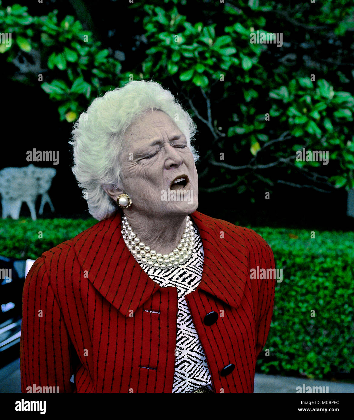washington dc usa may 10 1992 first lady barbara bush tlks with reporters after attending church sunday morning in washington dc notice that she is always touching her pearl necklace MCBPEC