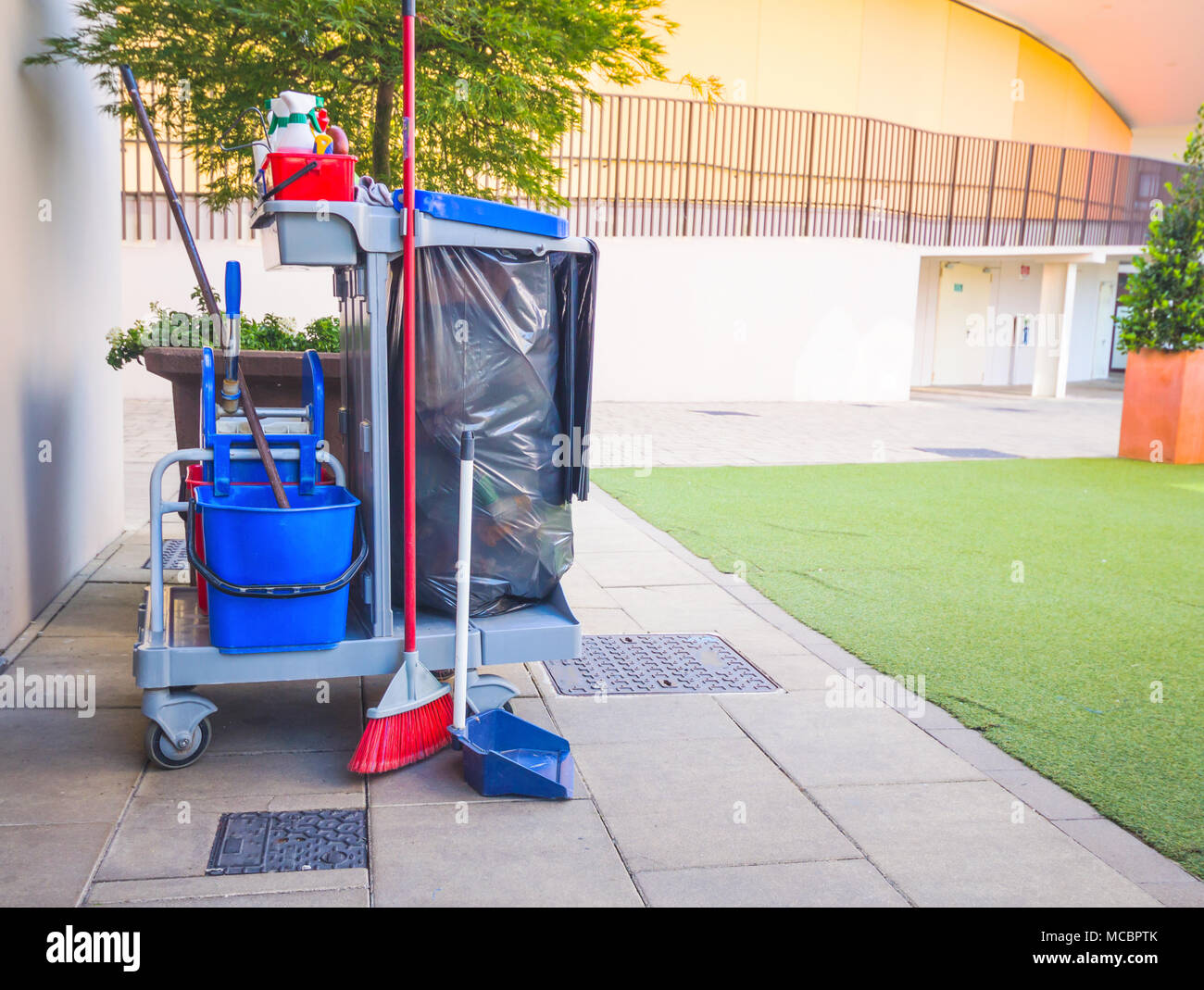 https://c8.alamy.com/comp/MCBPTK/cleaning-suppliescommercial-cleaning-equipment-with-cartprofessional-cleaning-equipment-as-mop-bucket-glove-cart-outdoor-MCBPTK.jpg