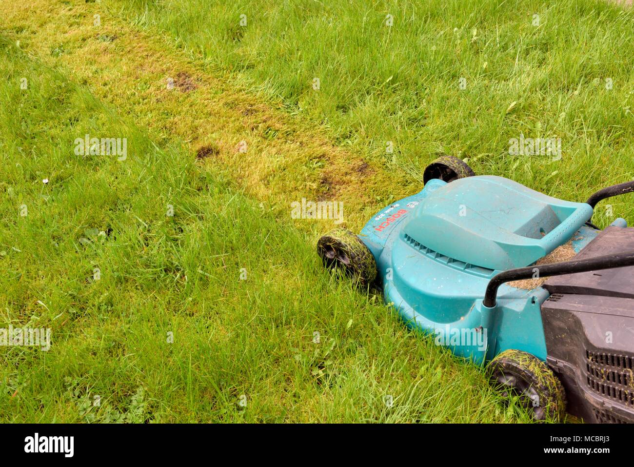 First lawn cut of the year Stock Photo Alamy