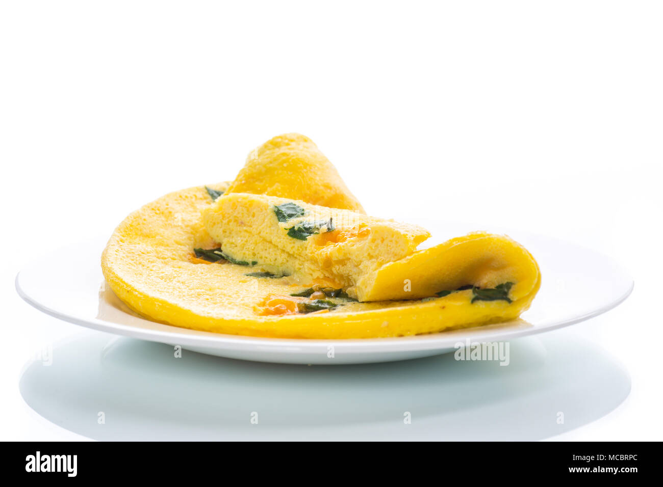 omelette from chicken eggs with green onion Stock Photo