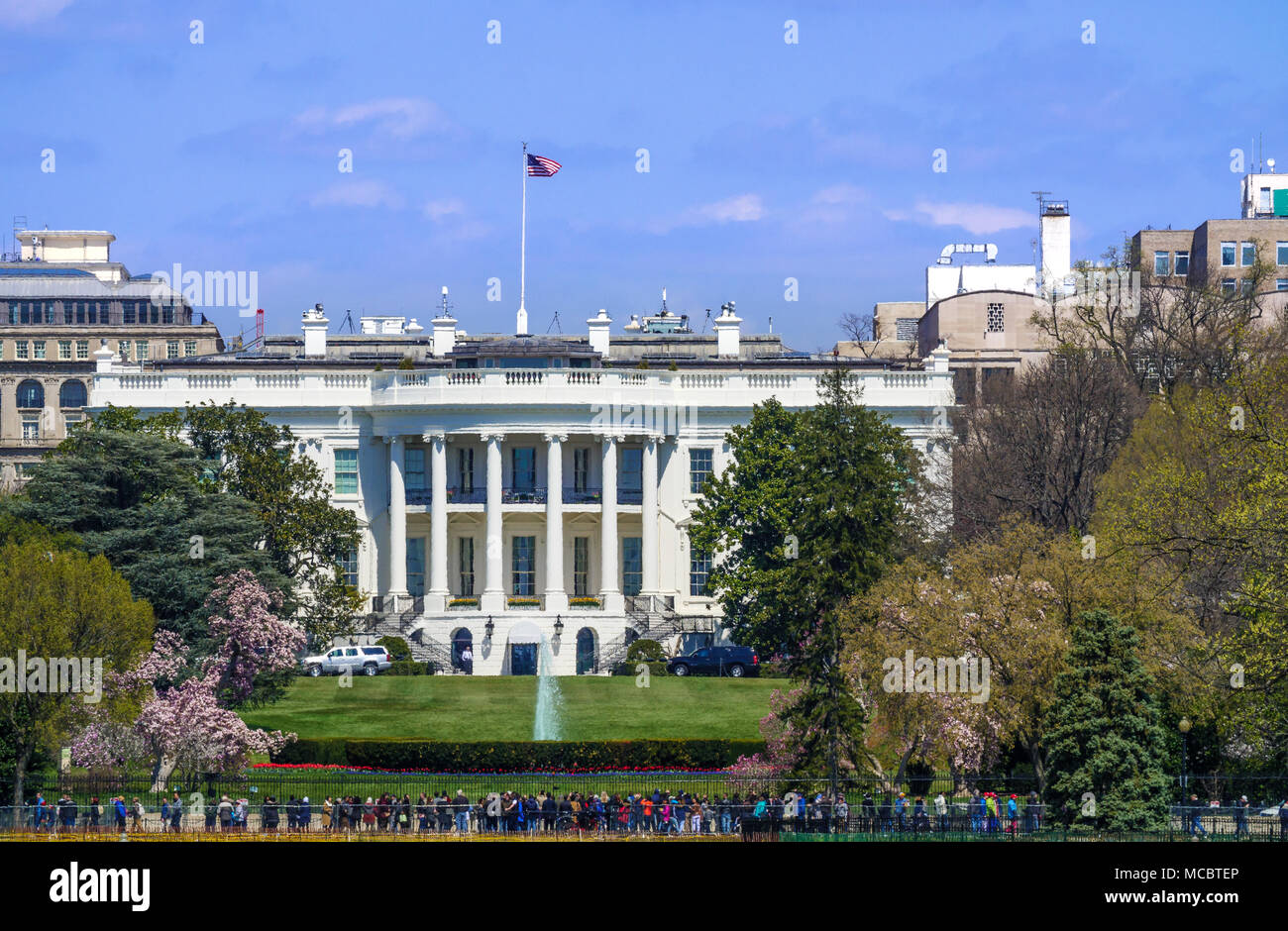 The White House viewed from the South Lawn on a bright day - Washington D.C., USA Stock Photo