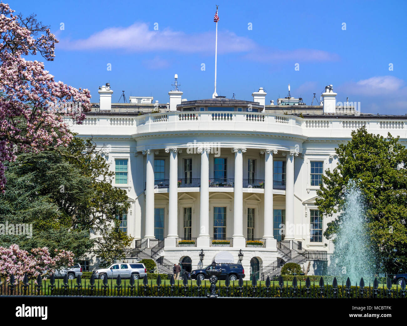The White House viewed from the South Lawn on a bright day - Washington D.C., USA Stock Photo