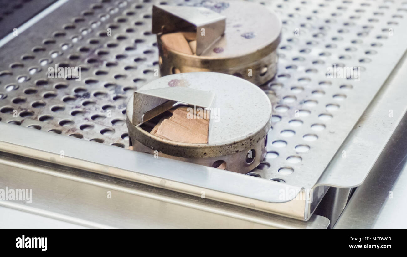 Stainless steel wood chip smoker box for gas grill Stock Photo Alamy