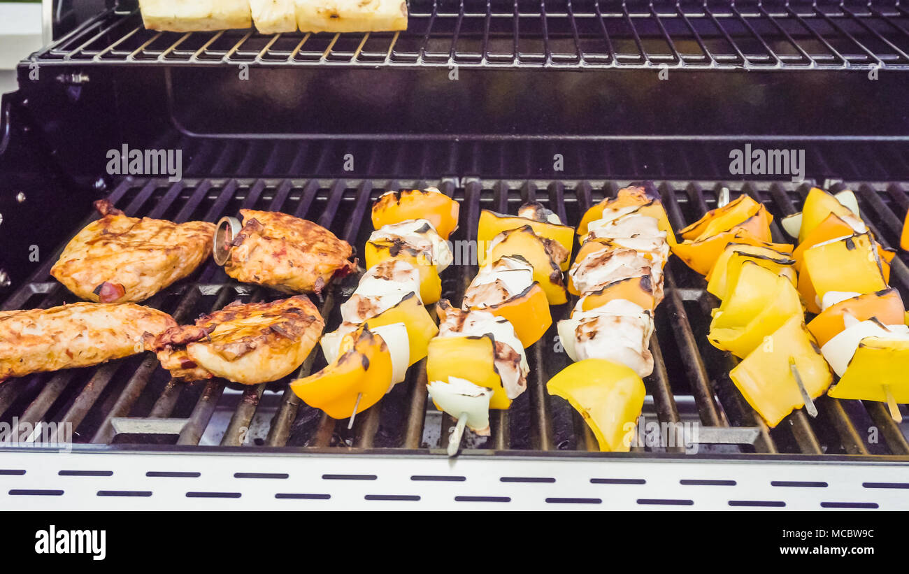 Step by step. Cooking chicken shish kabobs with bell peppers and yellow