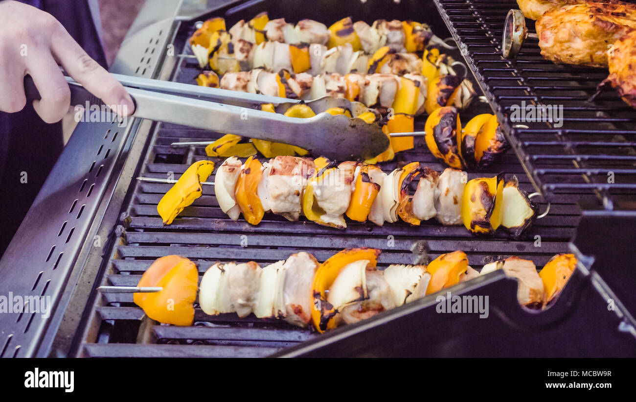 Step by step. Cooking chicken shish kabobs with bell peppers and yellow