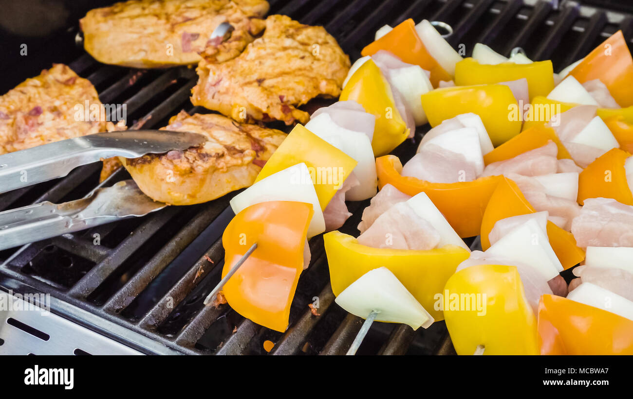 Step by step. Cooking chicken shish kabobs with bell peppers and yellow