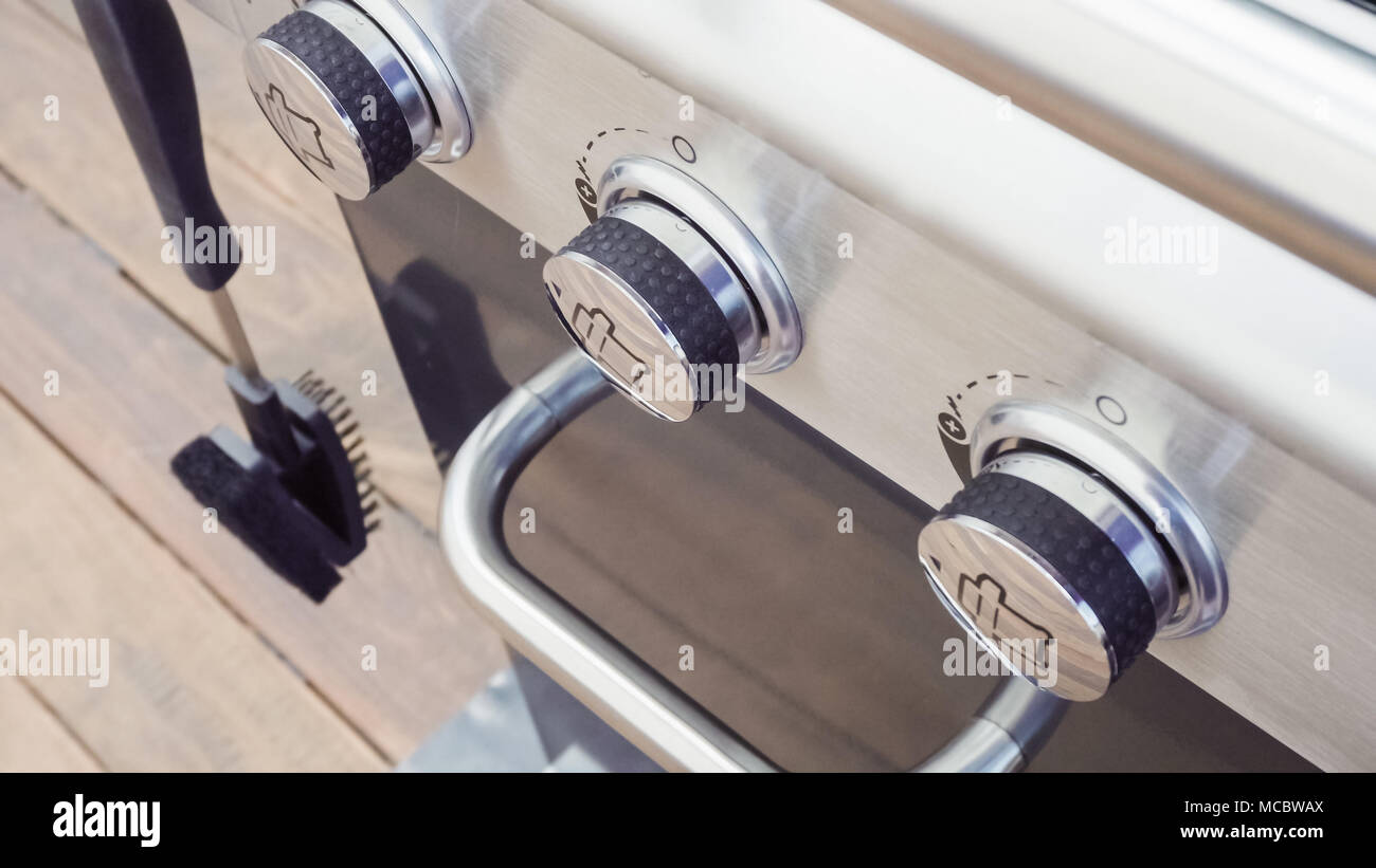 Close up of outdoor gas grill Stock Photo - Alamy