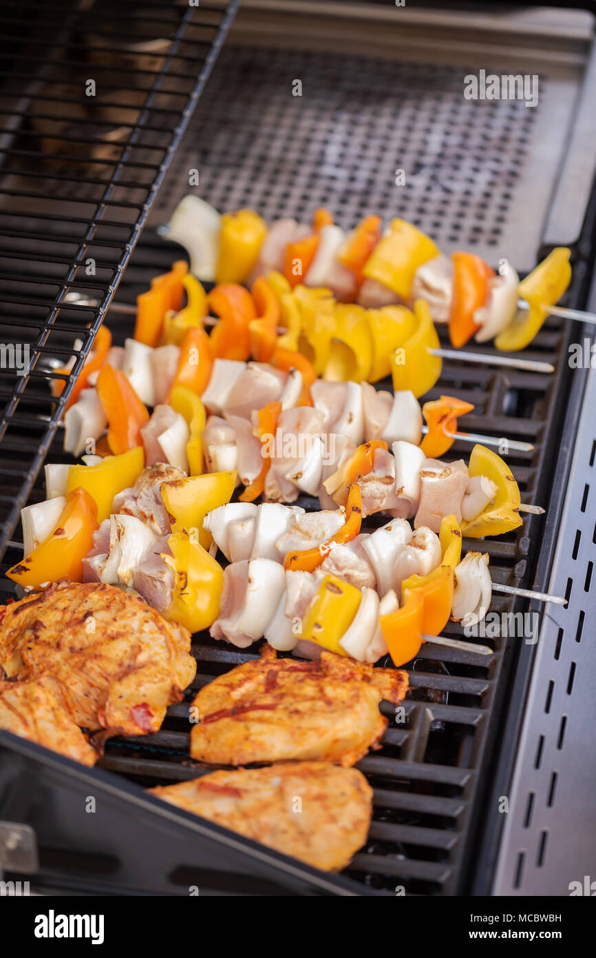 Step by step. Cooking chicken shish kabobs with bell peppers and yellow