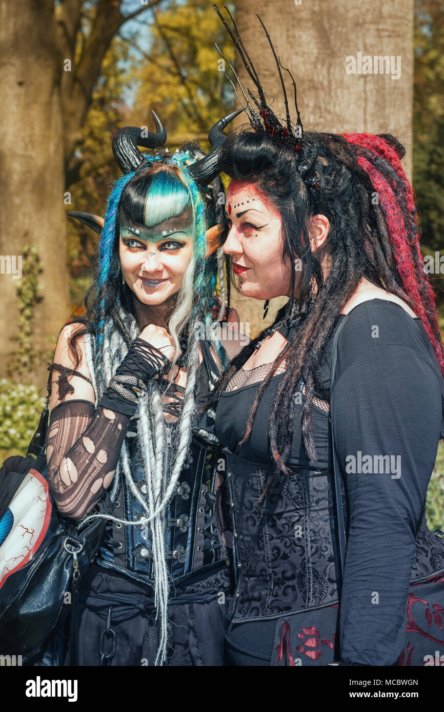 April  19, 2014, Haarzuilens, The Netherlands: Two devilish looking ladies on pose during the Elf Fantasy Fair (Elfia) which is an outdoor fantasy eve Stock Photo