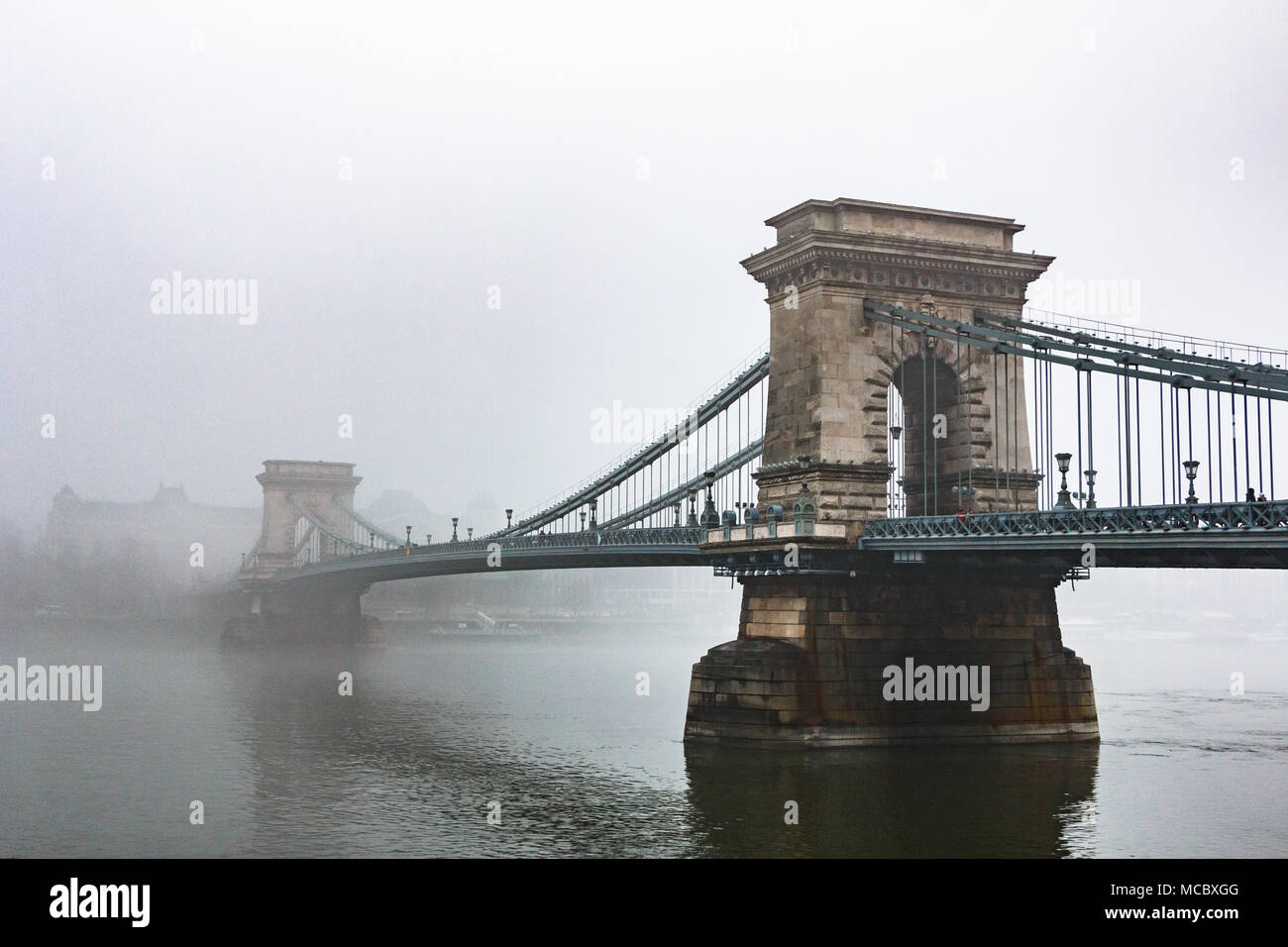 The Chain Bridge in Budapest on a foggy winter day Stock Photo