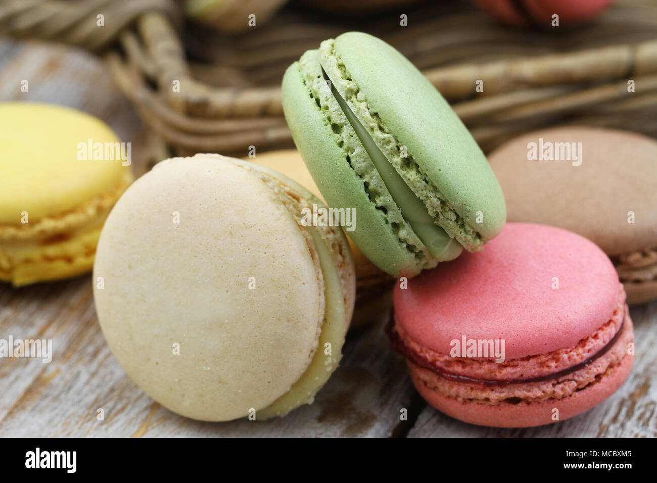 Closeup of pistachio, chocolate and raspberry macaroons Stock Photo