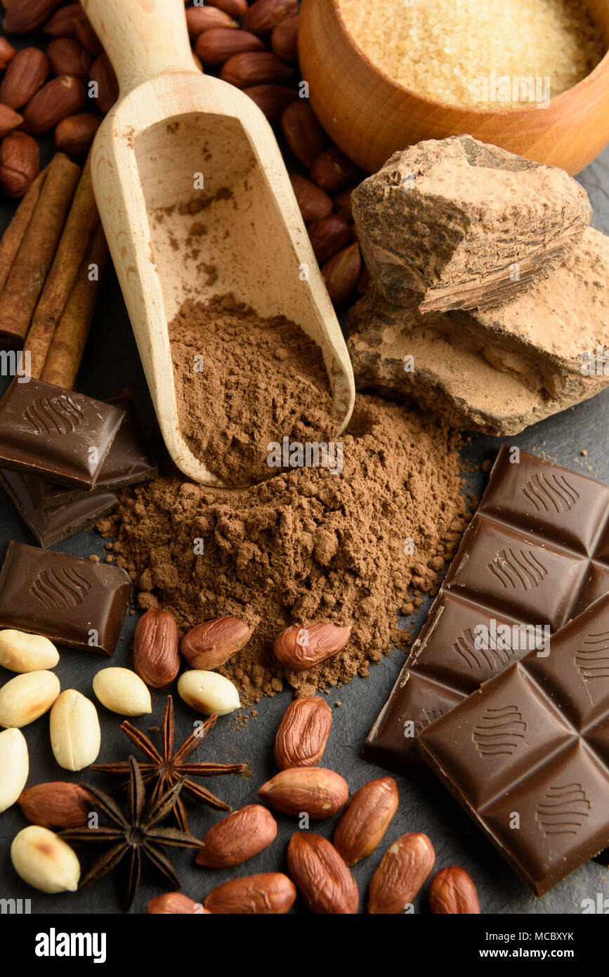 Cocoa powder, chocolate, nuts and spices Stock Photo