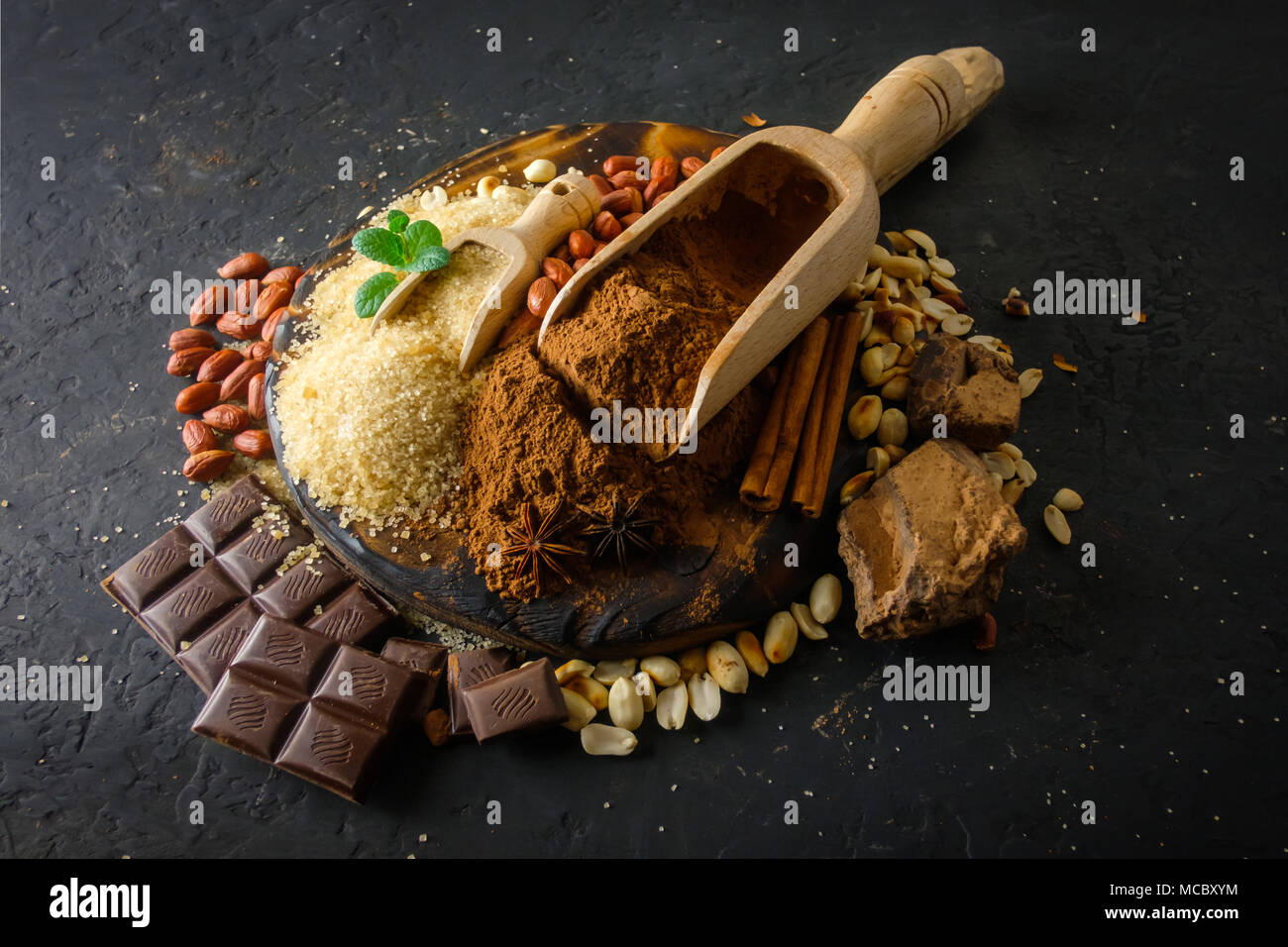 Cocoa powder, chocolate, nuts and spices Stock Photo