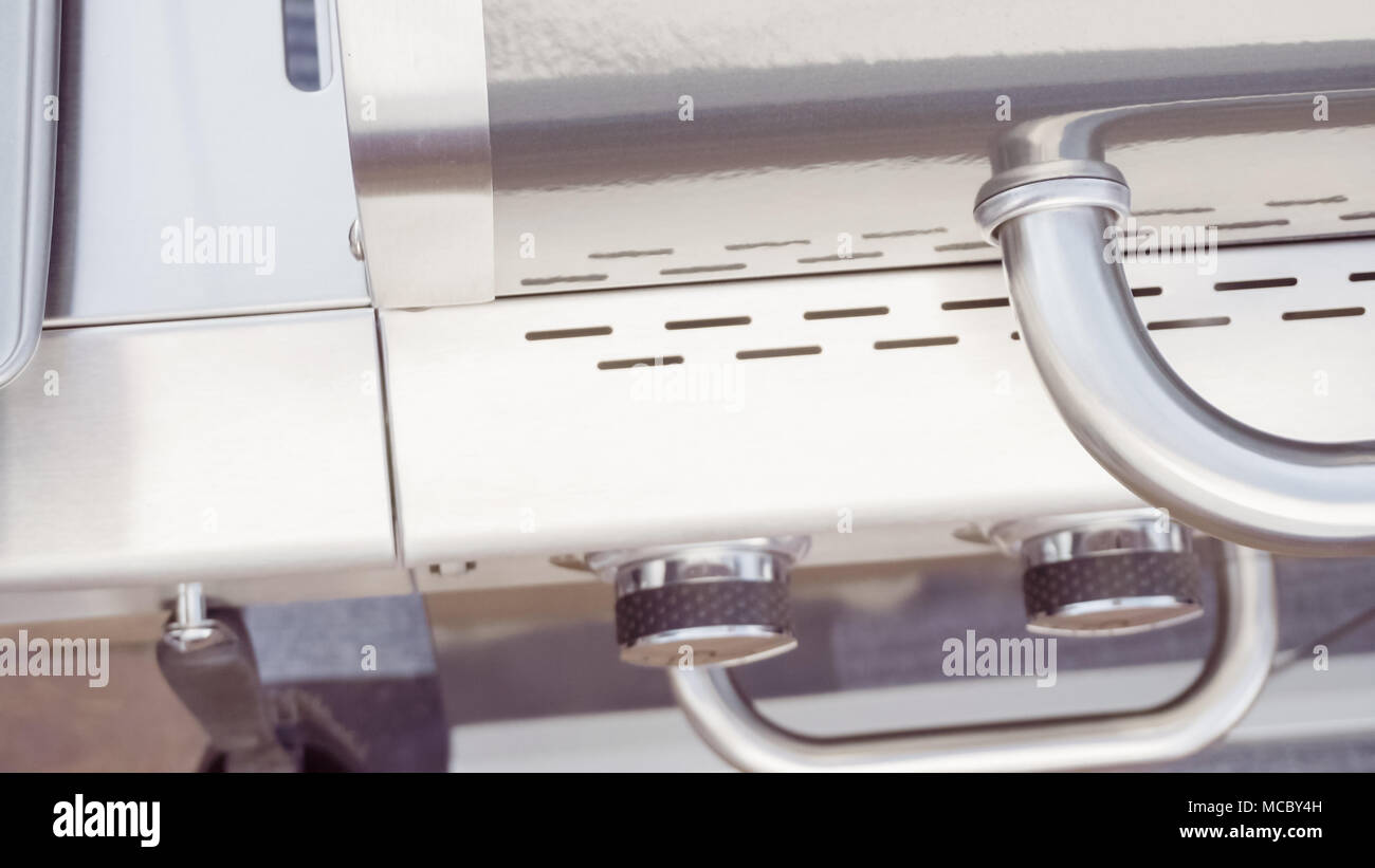 Close up of outdoor large gas grill Stock Photo - Alamy