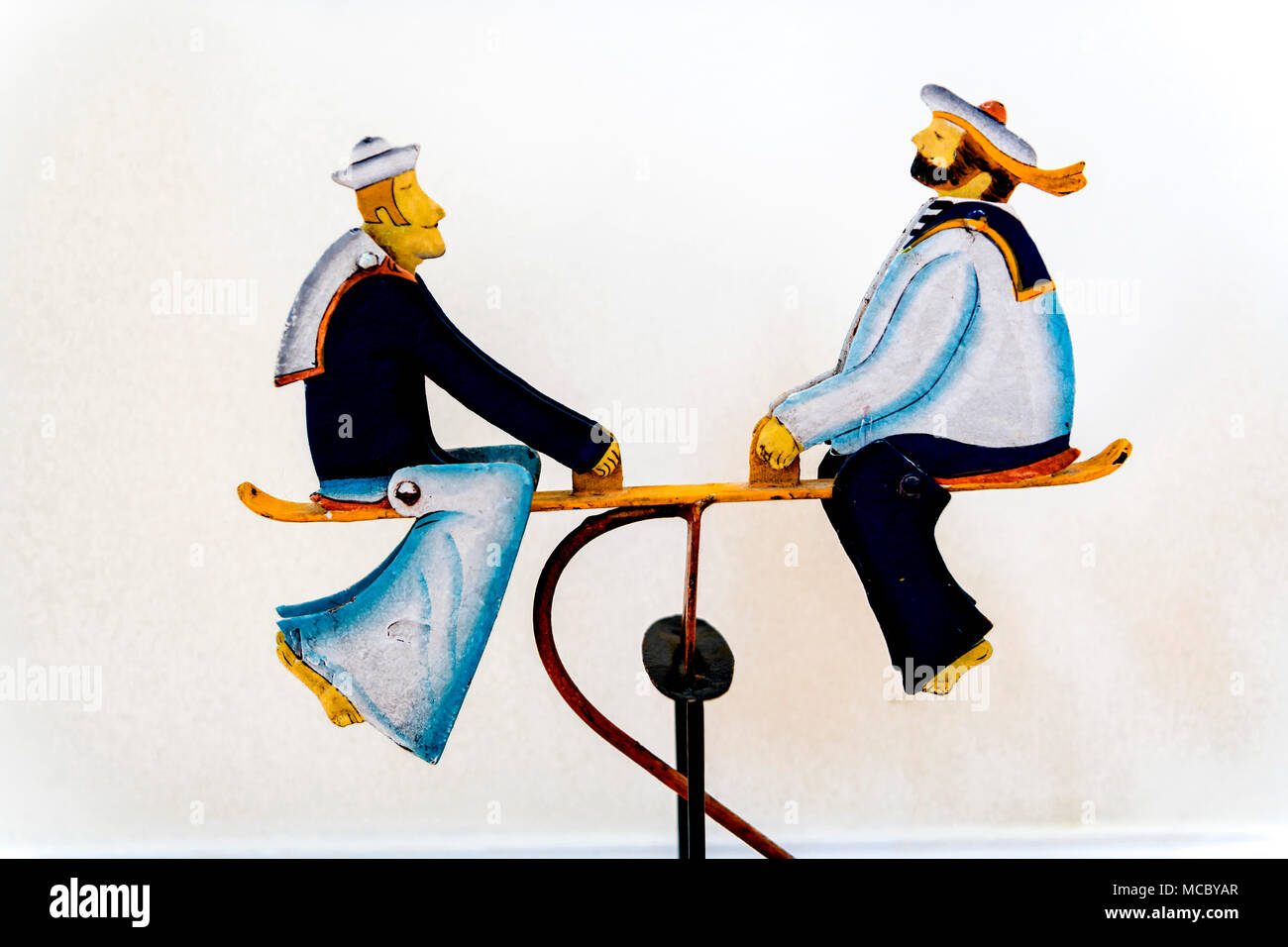 Two sailors on a seesaw: zwei Matrosen auf einer Wippe Stock Photo