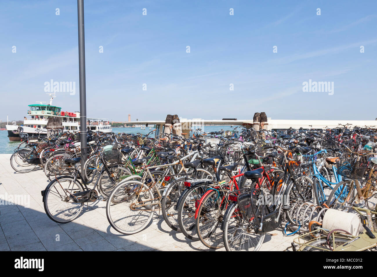 Bicycles parked in racks at the Santa Maria Elisabetta Vaporetto Station,  Lido (Lido di Venezia, Venice Lido), Venice, Veneto, Italy, the mode of  tran Stock Photo - Alamy