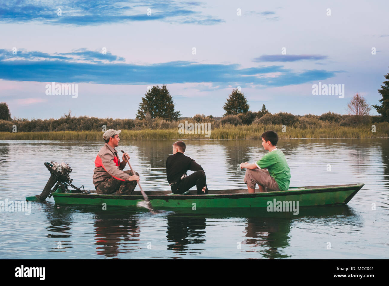 Two boys fishing in river hi-res stock photography and images - Alamy