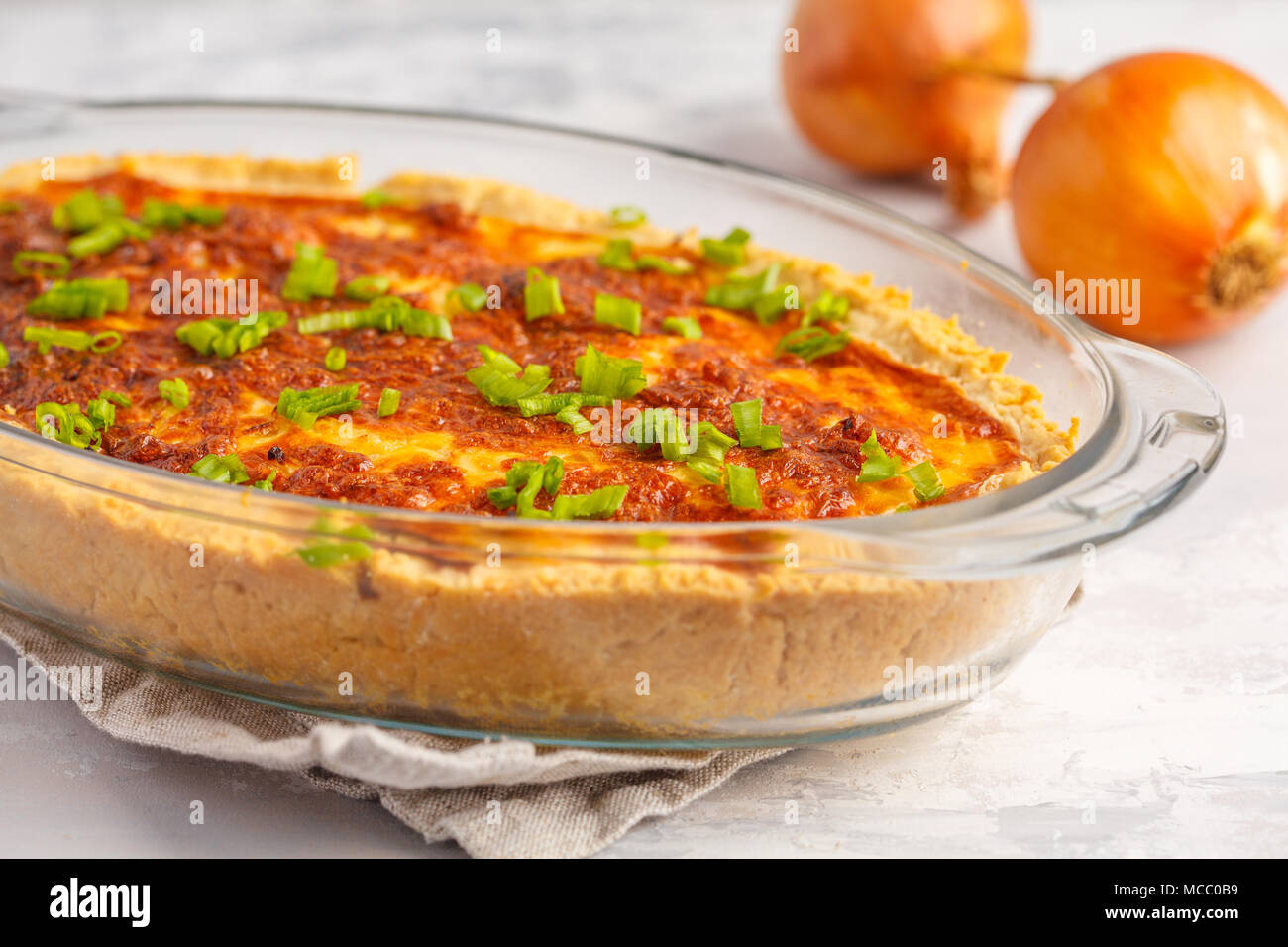 Traditional French onion pie. Quiche lorraine with onion, cheese and