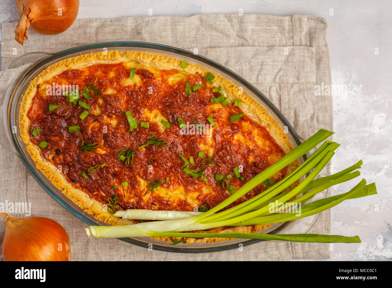 Traditional French onion pie. Quiche lorraine with onion, cheese and