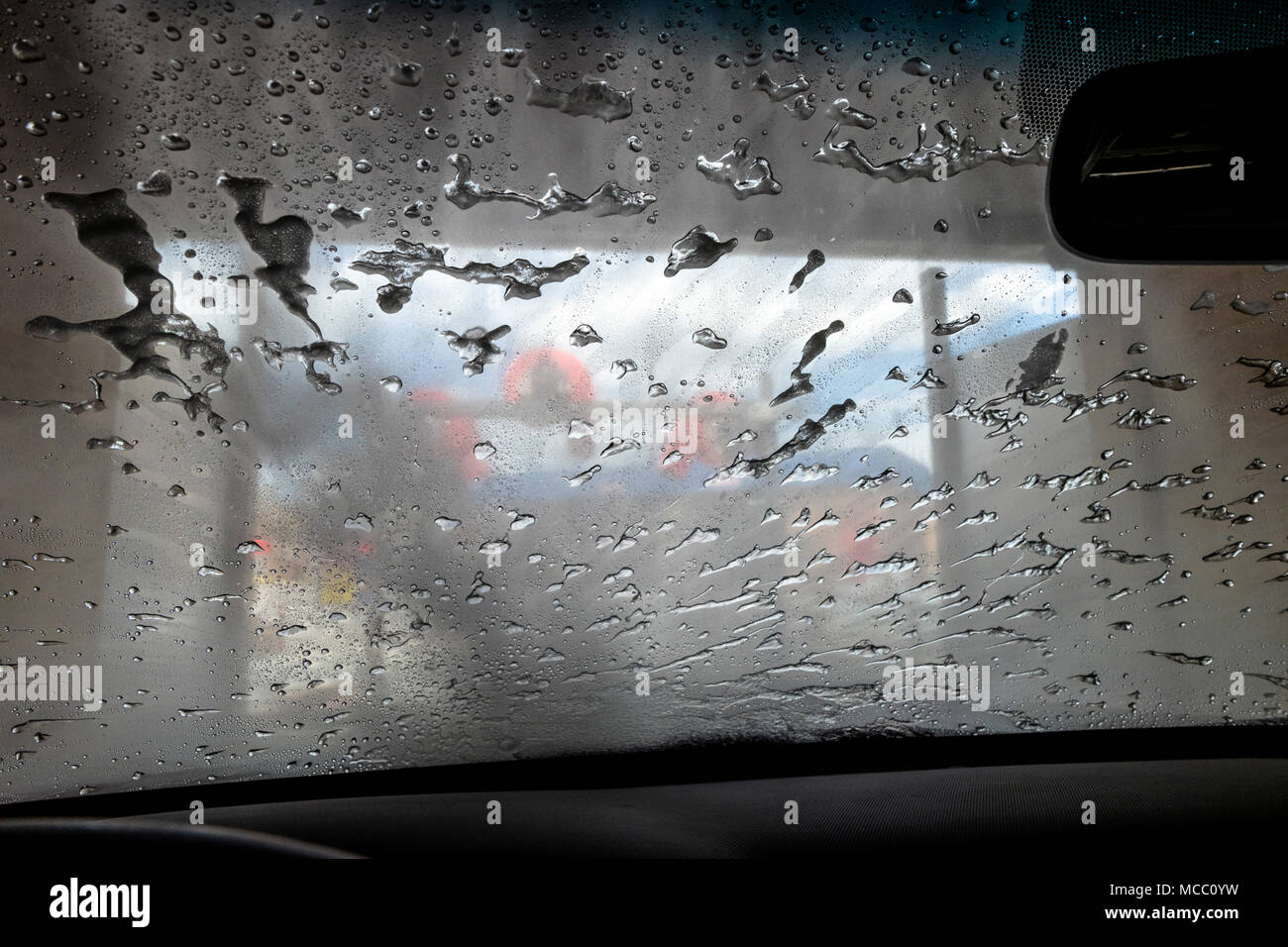 View through auto windshield, car wash Stock Photo Alamy